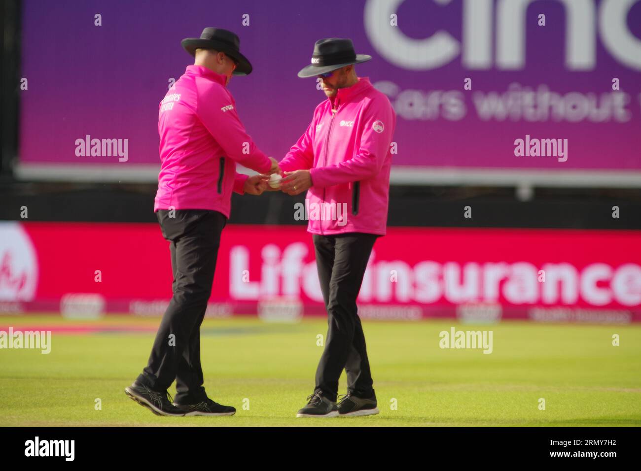 Chester le Street, 30 August 2023. Umpires Martin Saggersand Mike Burns inspect the ball during a First Vitality T20 International match between England and New Zealand in the  at Seat Unique Riverside.  Credit: Colin Edwards/Alamy Live News Stock Photo