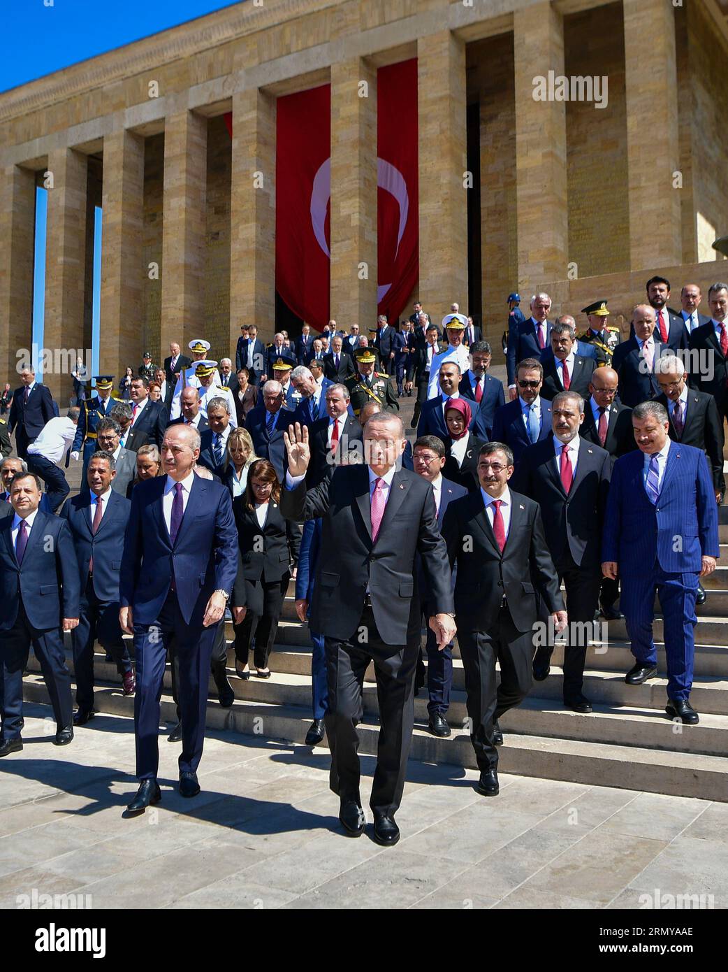 President of the Republic of Turkey, Recep Tayyip Erdogan, waves to his ...