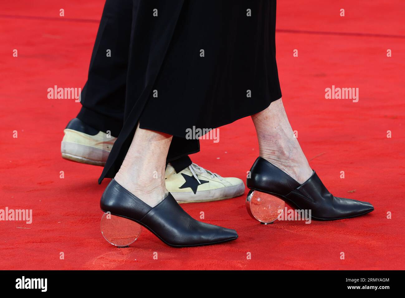 Lido Di Venezia, Italy. 30th Aug, 2023. Charlotte Rampling and Director Liliana Cavani (shoes detail) attend the opening red carpet at the 80th Venice International Film Festival on August 30, 2023 in Venice, Italy. © Photo: Cinzia Camela. Credit: Live Media Publishing Group/Alamy Live News Stock Photo