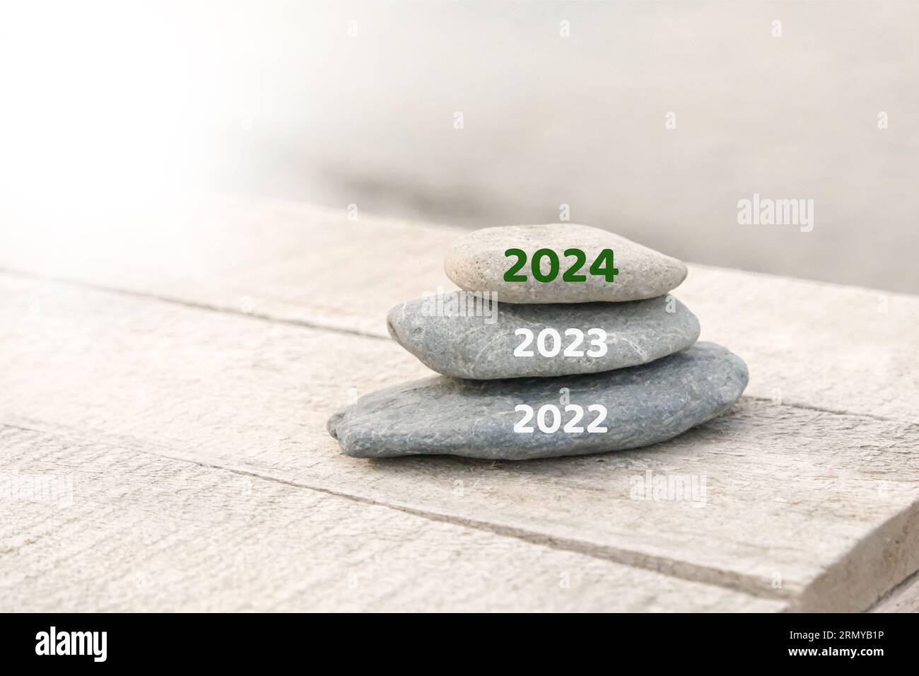 Happy new year, 2024 replace old 2023. New Year 2024 is coming concept idea on beach. Creative photo image can be used as display, printed canvas, web Stock Photo