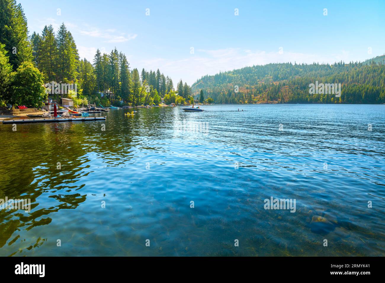 Summer day view of lakefront homes and docks at lower Twin Lakes, an