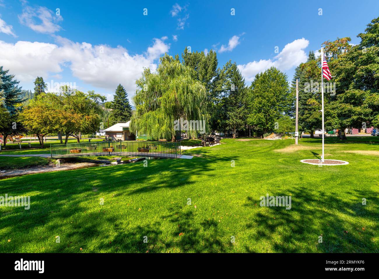 The scenic City Park with stream running through it in the rural town of Rathdrum, Idaho, a suburb of the general Coeur d'Alene area of North Idaho Stock Photo