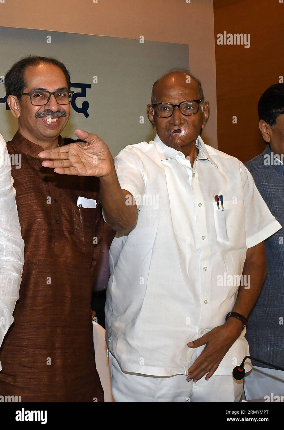 Mumbai, India. 30th Aug, 2023. L-R Shiv Sena (UBT) chief Uddhav Thackeray pose for a photo with Nationalist Congress Party (NCP) chief Sharad Govindrao Pawar after the Maha Vikas Aghadi (MVA) press conference in Mumbai. The press conference was held ahead of Indian National Developmental Inclusive Alliance (INDIA) third meeting to be held on 31st August and 1st September 2023. (Photo by Ashish Vaishnav/SOPA Images/Sipa USA) Credit: Sipa USA/Alamy Live News Stock Photo