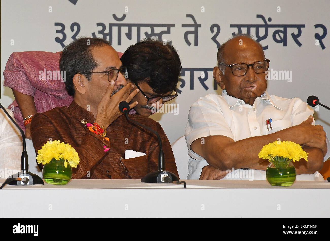 Mumbai, India. 30th Aug, 2023. L-R Shiv Sena (UBT) chief Uddhav Thackeray speaks to Member of Parliament (MP) Sanjay Raut as Nationalist Congress Party (NCP) chief Sharad Govindrao Pawar looks on during the Maha Vikas Aghadi (MVA) press conference in Mumbai. The press conference was held ahead of Indian National Developmental Inclusive Alliance (INDIA) third meeting to be held on 31st August and 1st September 2023. (Photo by Ashish Vaishnav/SOPA Images/Sipa USA) Credit: Sipa USA/Alamy Live News Stock Photo