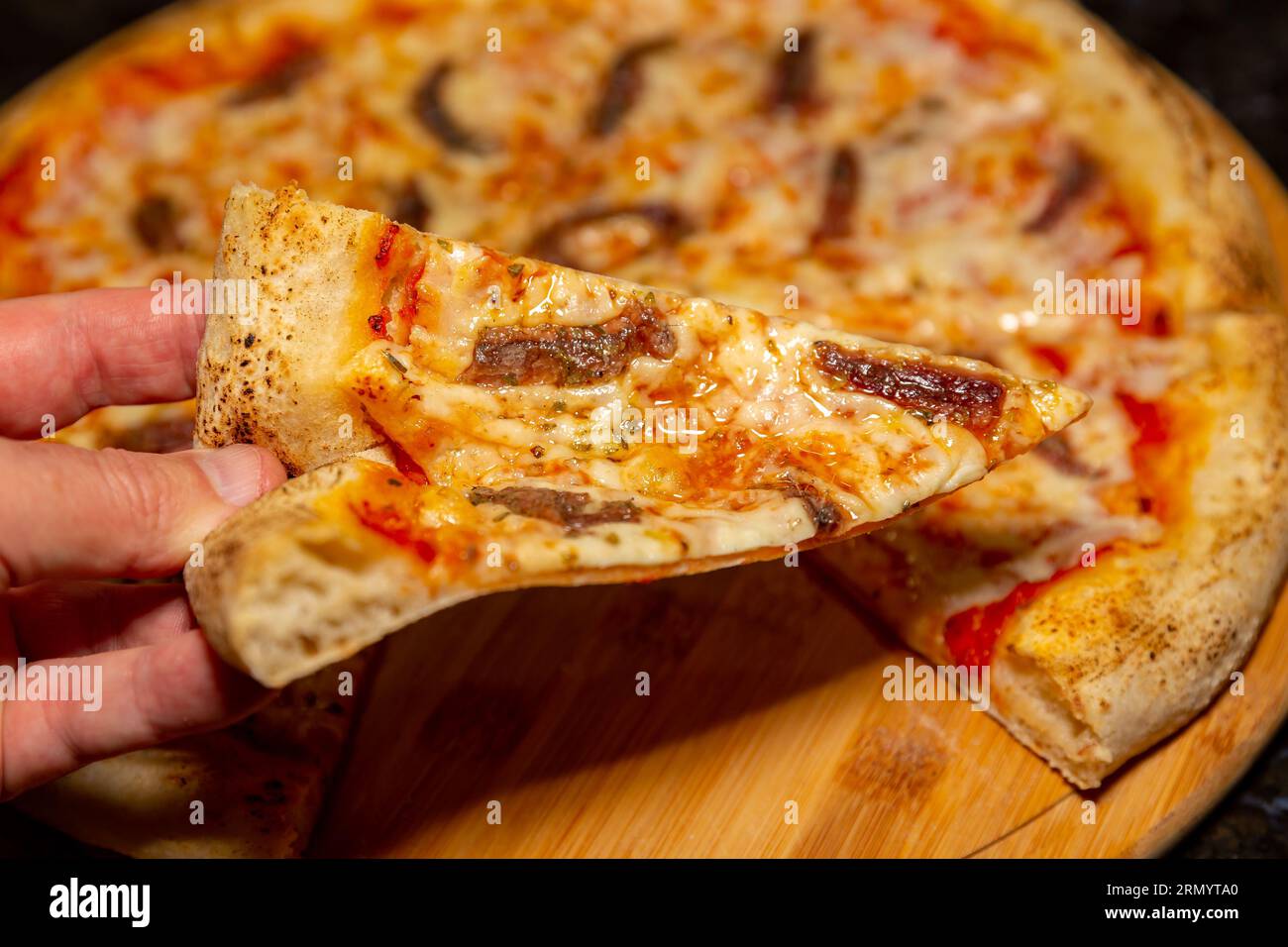Traditional anchovy pizza (alicci) with artisan longmatured dough