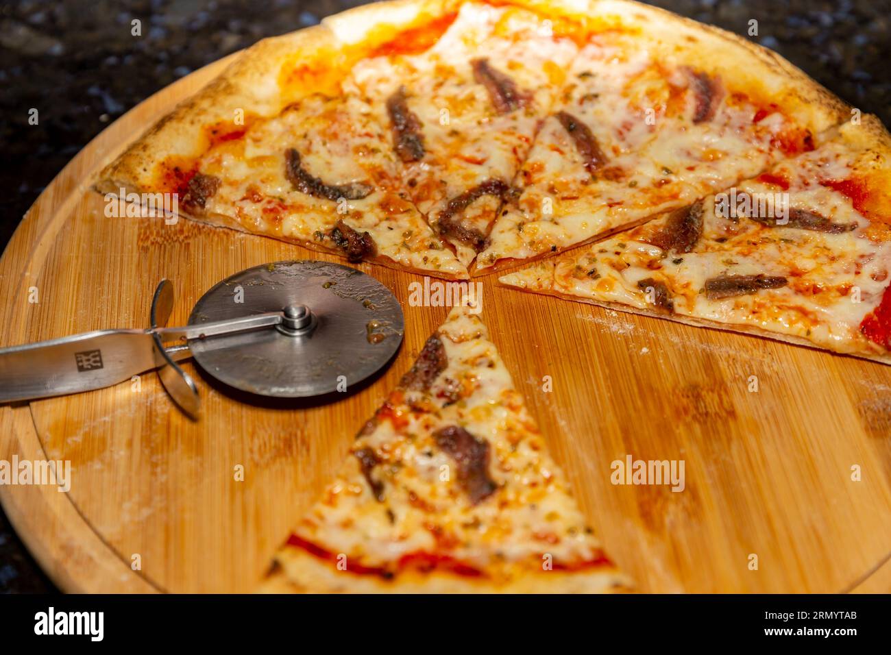 Traditional anchovy pizza (alicci) with artisan longmatured dough. "vera pizza" Neapolitan