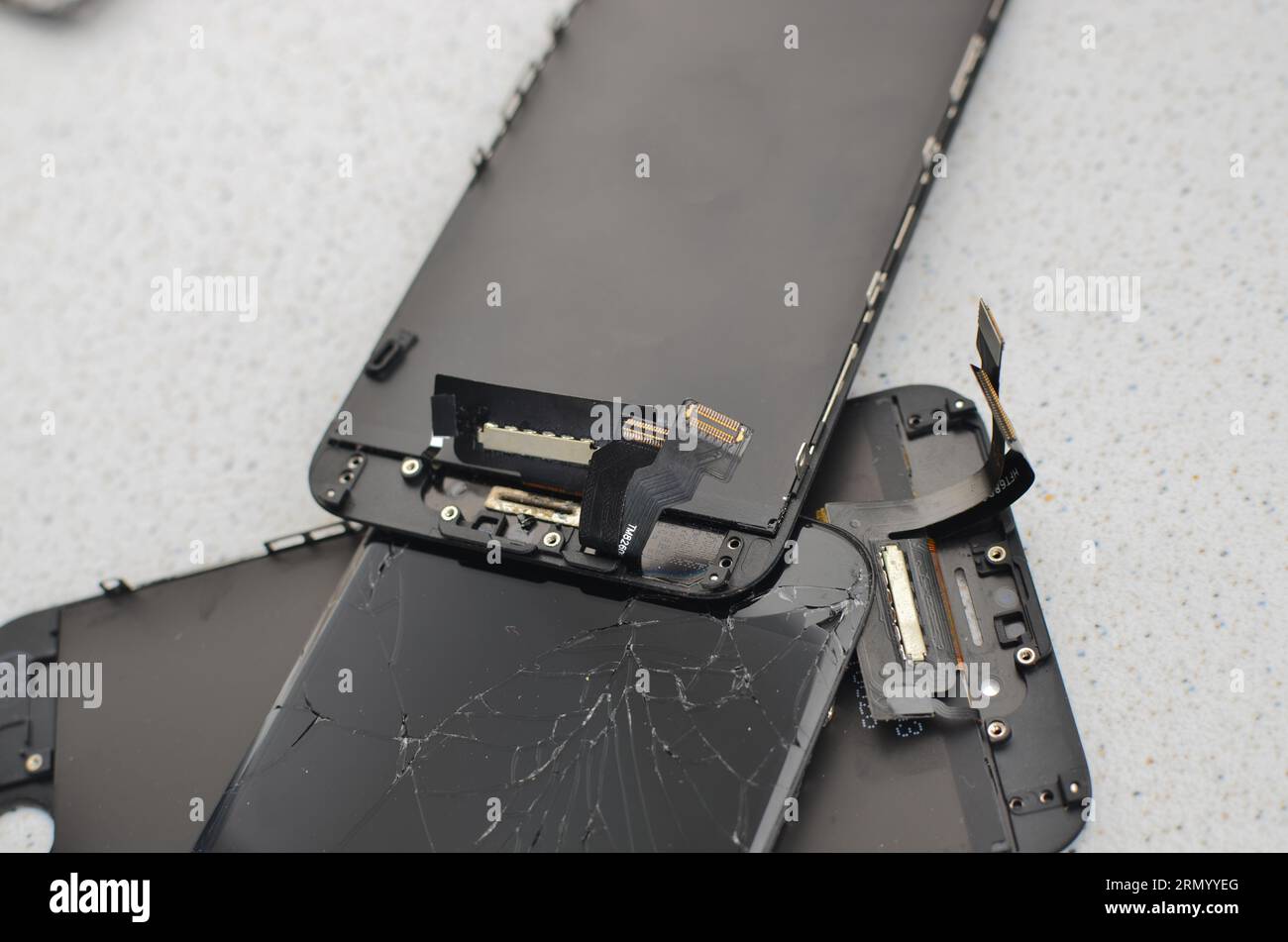 Closeup of a smartphone display, highlighting the concept of cell phone maintenance and repair. Great for illustrating the universe of technical assis Stock Photo