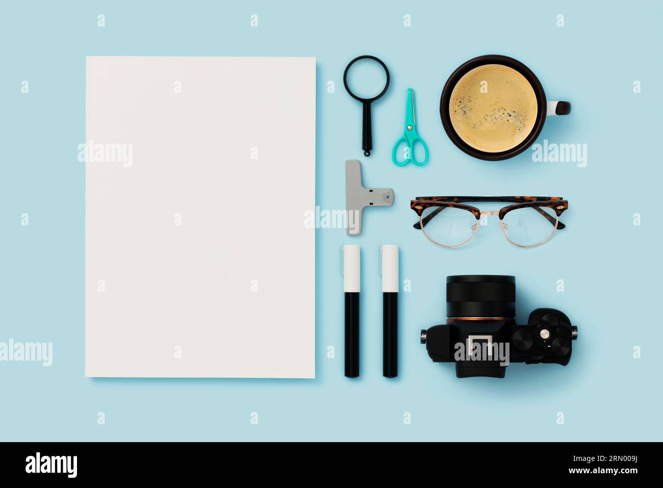 Back to school flat lays on blue background. Blank magazinecover mockup ...