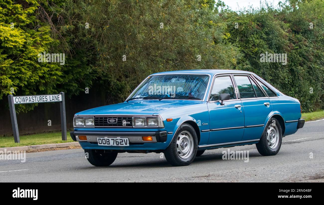Whittlebury,Northants,UK -Aug 27th 2023: 1979 blue Toyota Corolla   car travelling on an English country road Stock Photo
