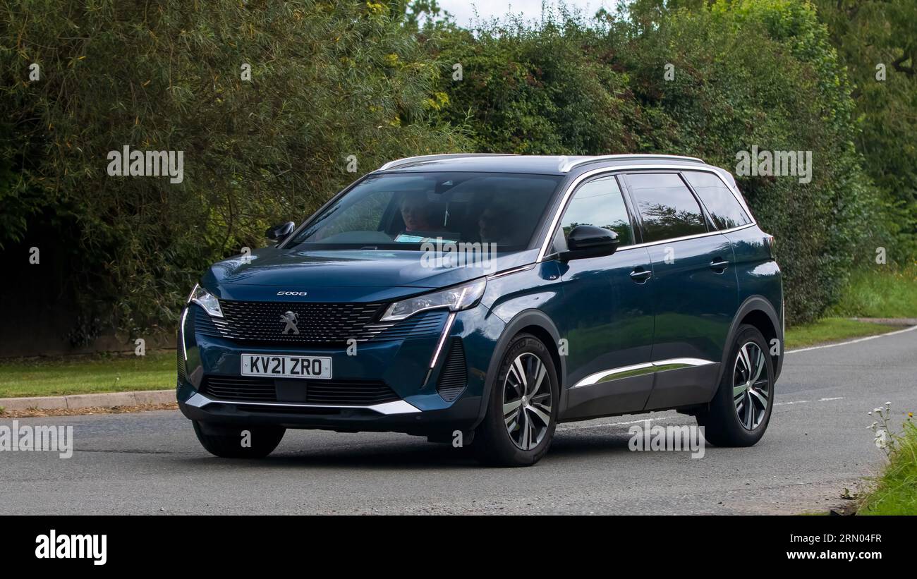 Whittlebury,Northants,UK -Aug 27th 2023: 2021 PEUGEOT 5008 GT PURETECH SS   car travelling on an English country road Stock Photo
