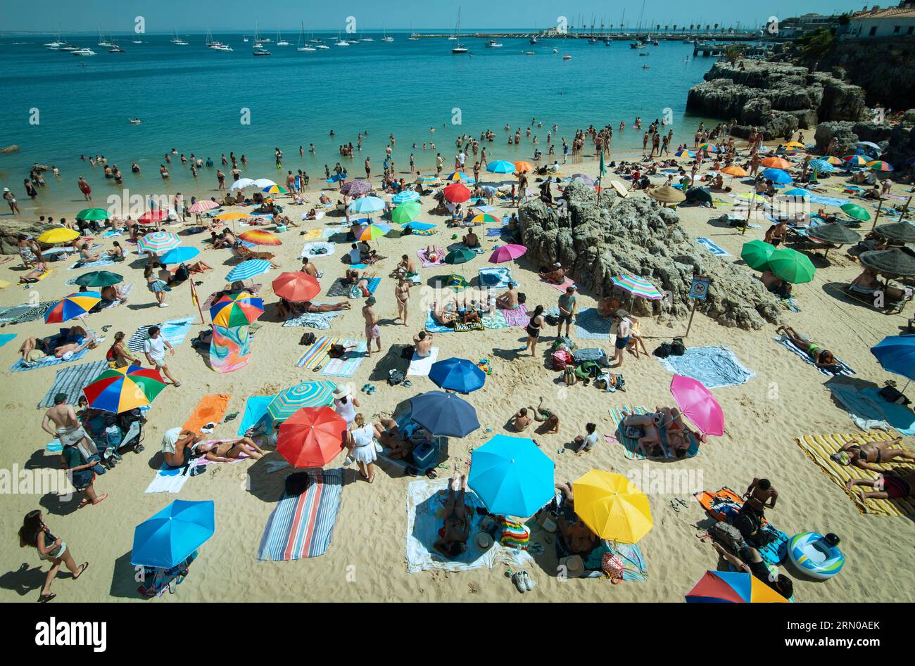 Sunday afternoon at Praia da Rainha Beach at the center of Cascais, Portugal. Stock Photo