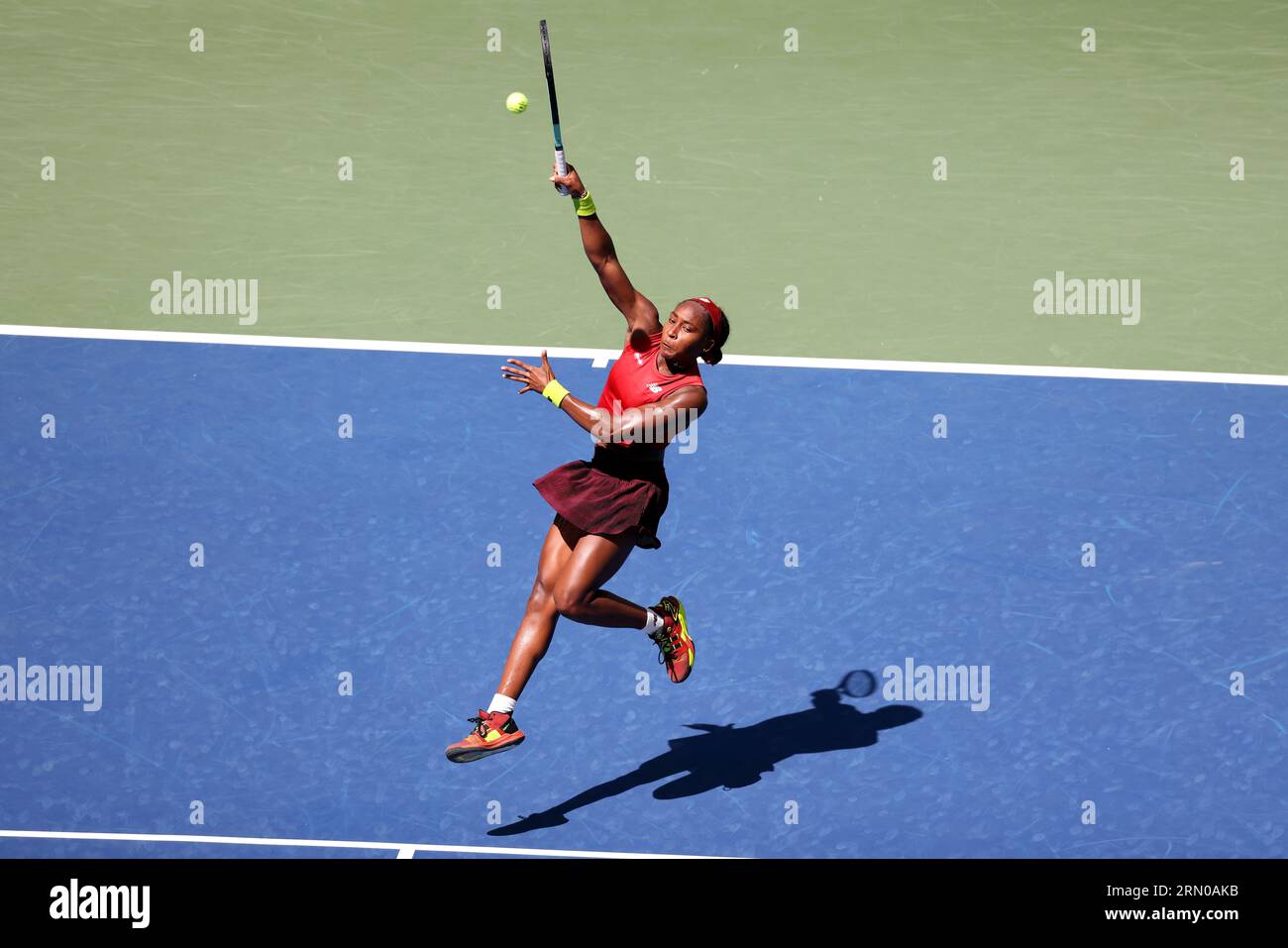 New York City, New York. 30th Aug, 2023. NEW YORK CITY, NEW YORK - AUGUST 30: An airborne Coco Gauff strikes an overhead during her match against Mirra Andreeva pm Day 3 of the US Open at the USTA Billie Jean King National Tennis Center on August 30, 2023 in New York City, New York. ( Credit: Adam Stoltman/Alamy Live News Stock Photo