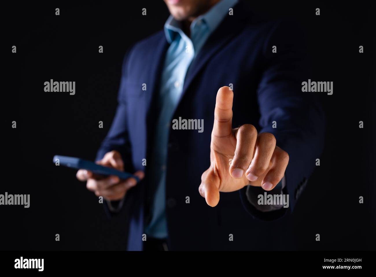 Pointing black background hi-res stock photography and images - Alamy