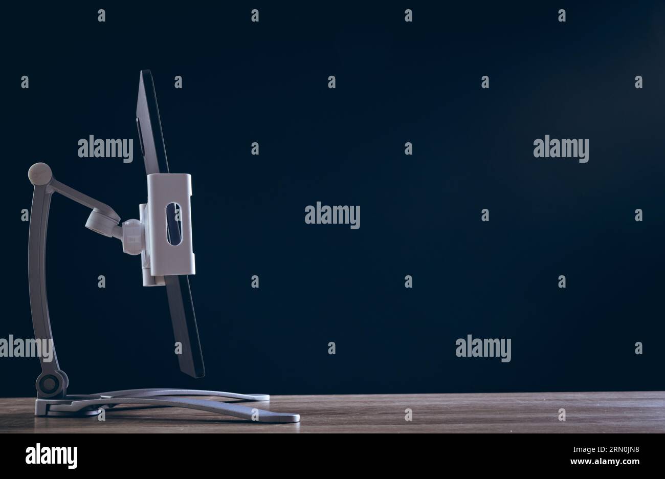 Tablet screen with copy space on black background Stock Photo