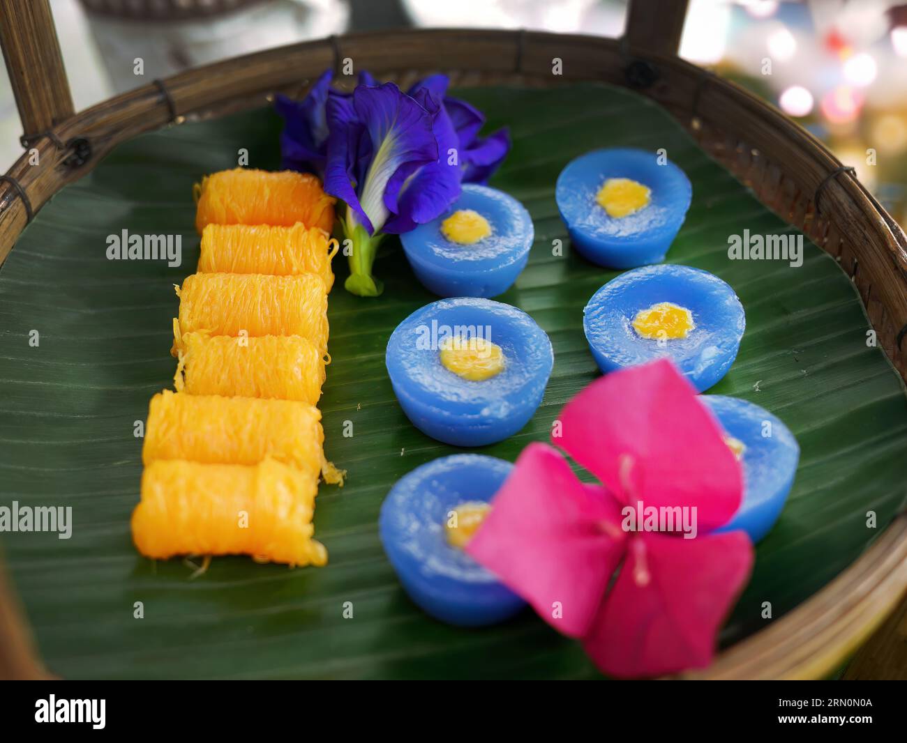 Various kind and color of Thai sweet dessert snack on banana leaf in ...