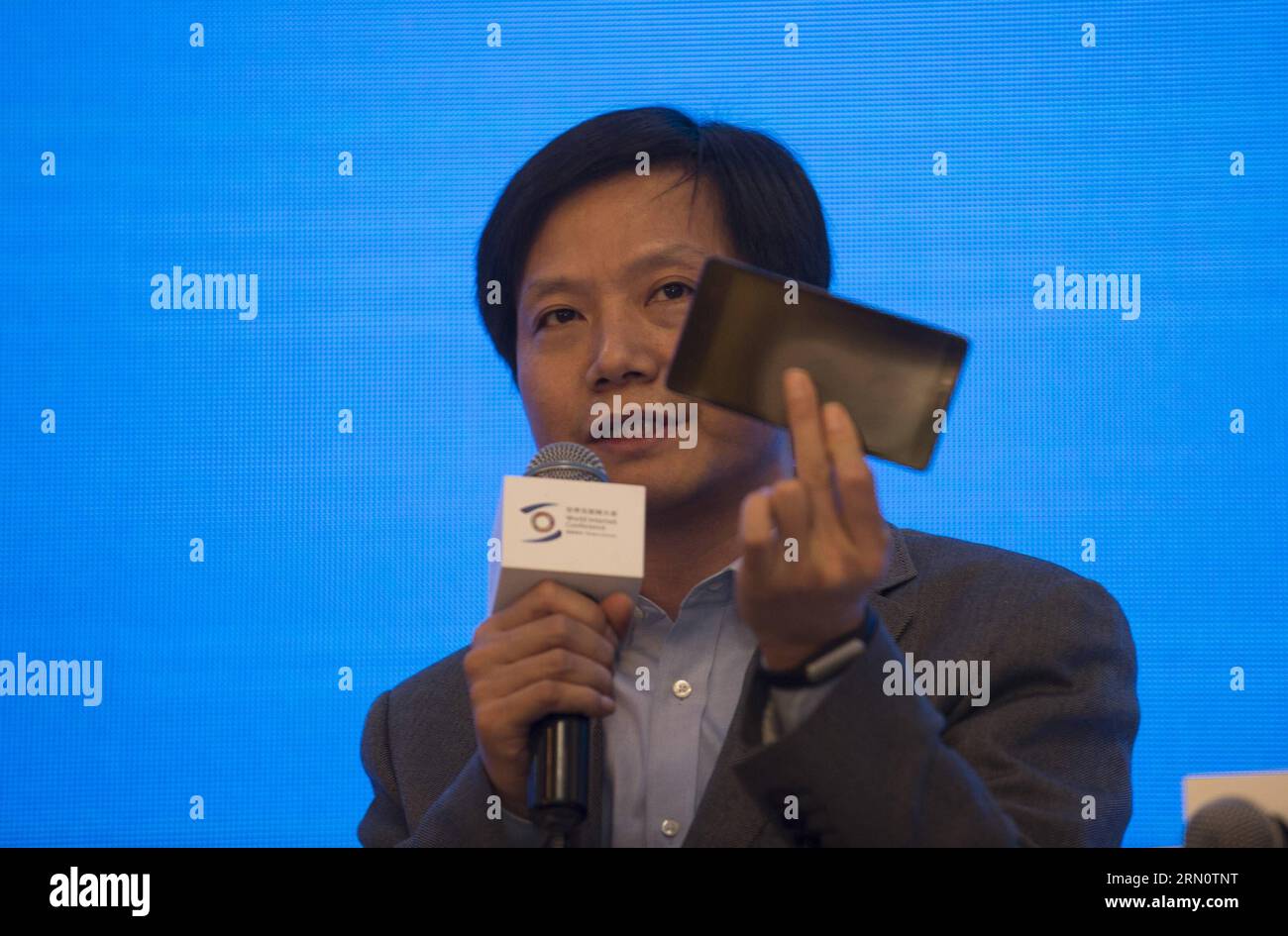 (141119) -- WUZHEN, Nov. 19, 2014 -- Lei Jun, CEO of Xiaomi, a technology firm, delivers a speech at a forum on creating an online global village during the 2014 World Internet Conference in Wuzhen, east China s Zhejiang Province, Nov. 19, 2014. Representatives from nearly 100 countries and regions took part in the three-day 2014 World Internet Conference that kicked off Wednesday in Wuzhen. ) (lmm) CHINA-ZHEJIANG-WUZHEN-WORLD INTERNET CONFERENCE (CN) JuxHuanzong PUBLICATIONxNOTxINxCHN   Wuzhen Nov 19 2014 Lei jun CEO of Xiaomi a Technology Firm delivers a Speech AT a Forum ON creating to Onli Stock Photo
