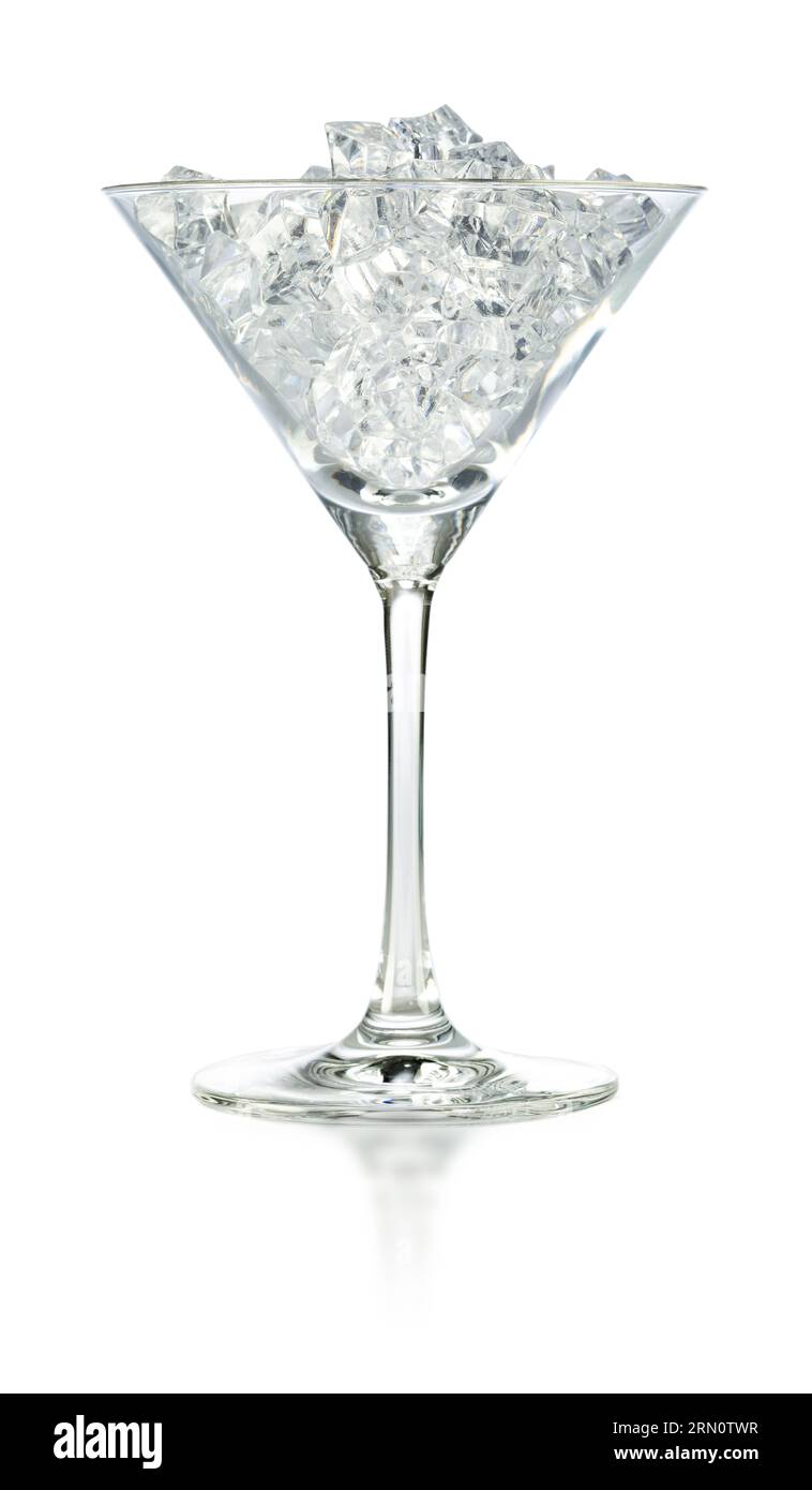 Empty martini cup with ice cubes isolated on white background. Studio shot. Stock Photo