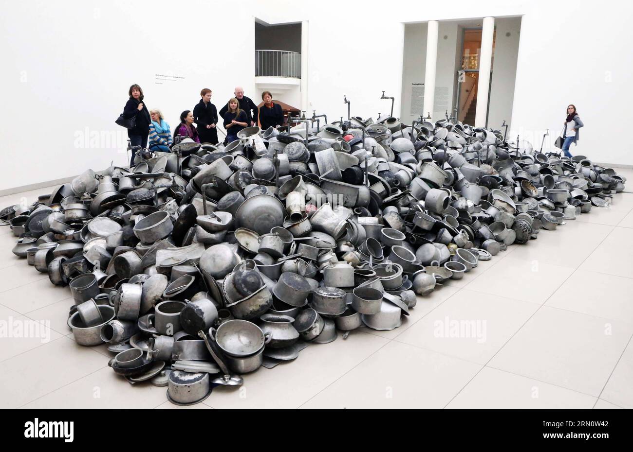 (141120) -- FRANKFURT, Nov. 19, 2014 -- Visitors admire art works at the exhibition Everything is Inside of the Indian artist Subodh Gupta at the Museum for Modern Art in Frankfurt, Germany, on Nov. 19, 2014. The exhibition held from Sept. 12, 2014 to Feb. 1, 2015. ) GERMANY-FRANKFURT-EXHIBITION LuoxHuanhuan PUBLICATIONxNOTxINxCHN   Frankfurt Nov 19 2014 Visitors admire Art Works AT The Exhibition Everything IS Inside of The Indian Artist Subodh Gupta AT The Museum for Modern Art in Frankfurt Germany ON Nov 19 2014 The Exhibition Hero from Sept 12 2014 to Feb 1 2015 Germany Frankfurt Exhibitio Stock Photo