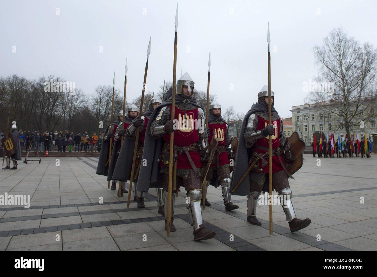 (141123) -- VILNIUS, Nov. 23, 2014 -- Soldiers in ancient military uniforms attend the celebration with a formation in Vilnius, Lithuania, on Nov. 23, 2014. Lithuanian armed forces and troops of some NATO member countries held a gala with formation on Sunday to celebrate the Armed Forces Day. Lithuania s first decree on establishing armed forces was approved on Nov. 23, 1918, which became the Armed Forces Day of the Baltic country. )(bxq) LITHUANIA-VILNIUS-ARMED FORCES DAY AlfredasxPliadis PUBLICATIONxNOTxINxCHN   Vilnius Nov 23 2014 Soldiers in Ancient Military UNIFORMS attend The Celebration Stock Photo