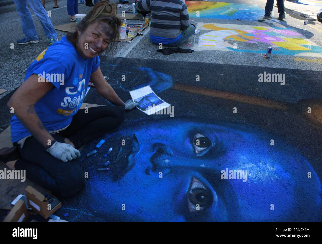 An artist paints during the street graffiti contest in Houston, the United States, on Nov. 23, 2014. Hundreds of paintings were created during the street graffiti contest in Houston. ) U.S.-HOUSTON-STREET GRAFFITI SongxQiong PUBLICATIONxNOTxINxCHN   to Artist Paints during The Street Graffiti Contest in Houston The United States ON Nov 23 2014 hundreds of Paintings Were Created during The Street Graffiti Contest in Houston U S Houston Street Graffiti  PUBLICATIONxNOTxINxCHN Stock Photo