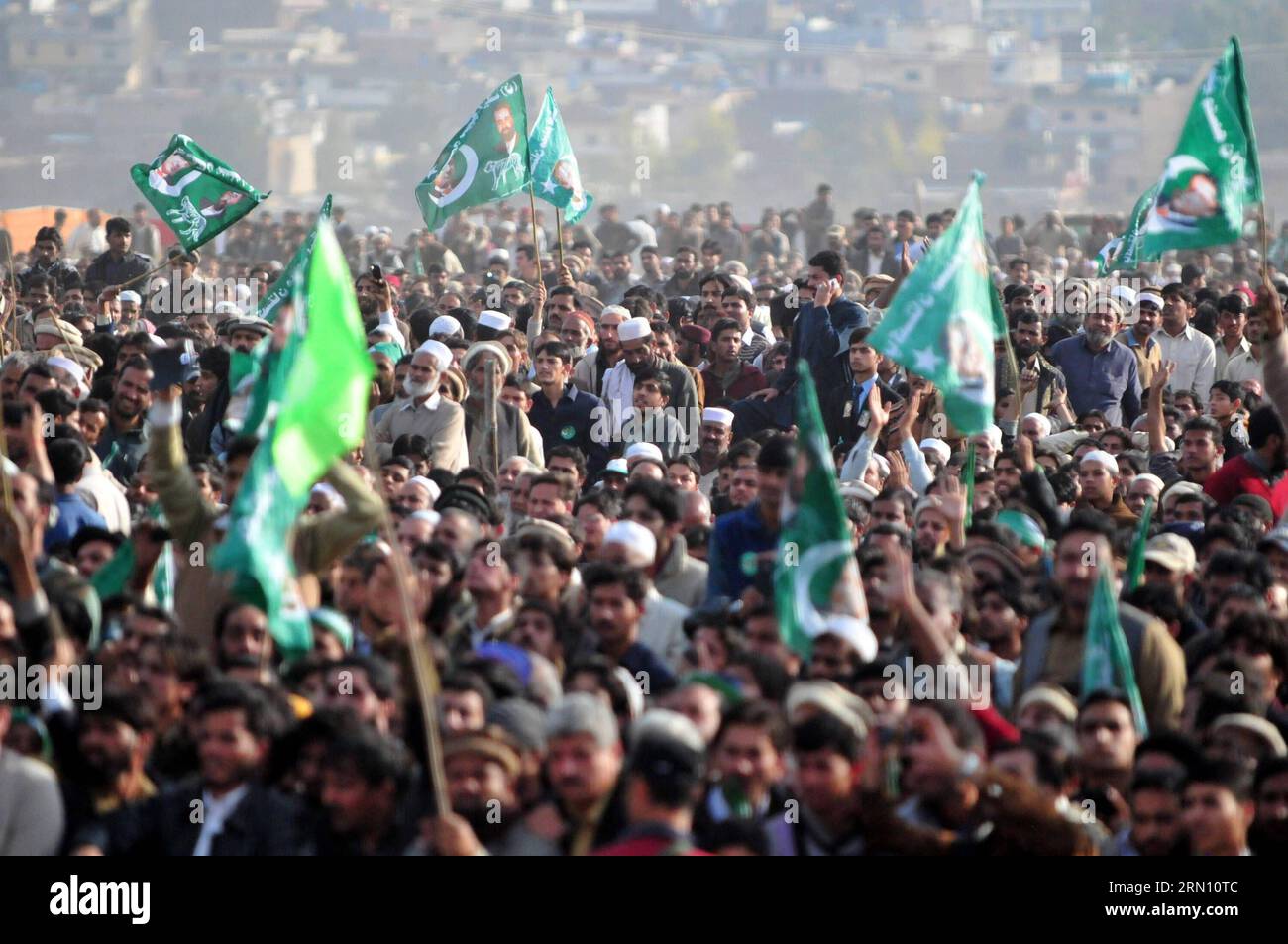 (141129) -- HAVELIAN, Nov. 29, 2014 -- Supporters of ruling party Pakistan Muslim League-Nawaz (PML-N) gathered during a public meeting in northwest Pakistan s Havelian on Nov. 29, 2014. Pakistani Prime Minister Nawaz Sharif addressing a huge public meeting at Havelian on Saturday said that the multi-dimensional projects being undertaken by PML-N government would make Pakistan an Asian tiger. ) PAKISTAN-HAVELIAN-NAWAZ SHARIF-PUBLIC-MEETING AhmadxKamal PUBLICATIONxNOTxINxCHN   Nov 29 2014 Supporters of ruling Party Pakistan Muslim League Nawaz PML n gathered during a Public Meeting in Northwest Stock Photo