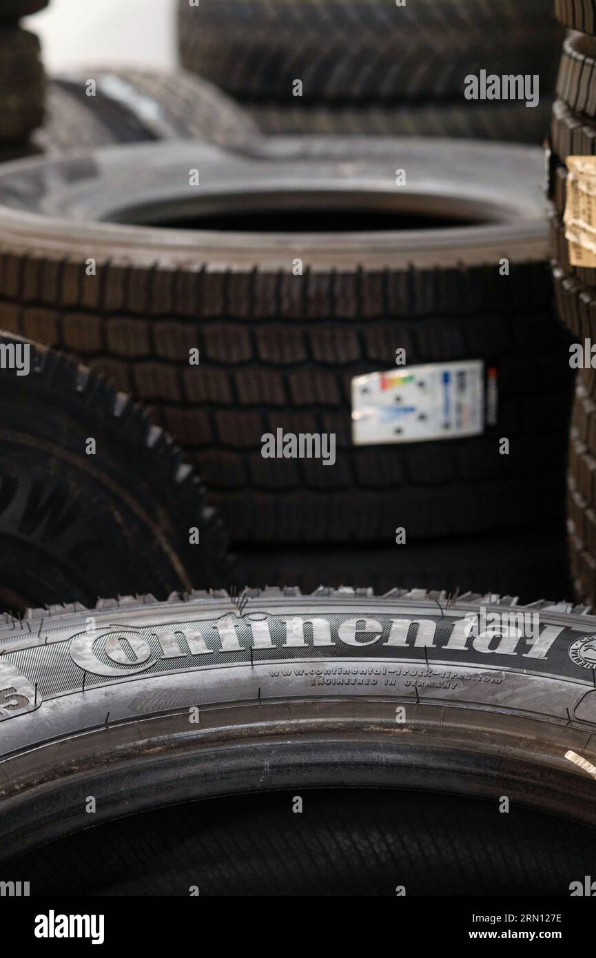 New tires in a car center Continental winter tires for utility