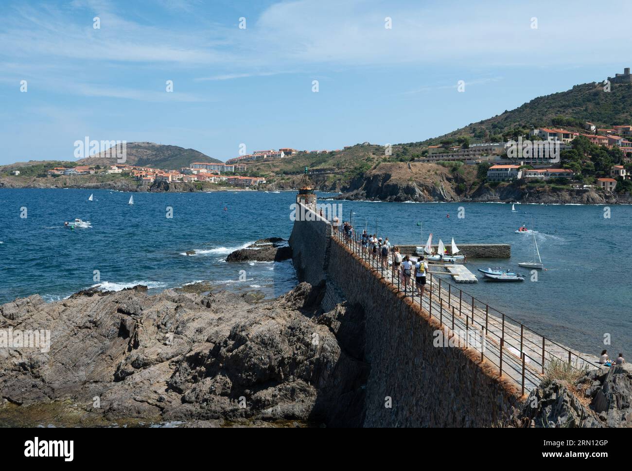 Collioure (south of France): pier, buoys and buildings along the waterfront Stock Photo