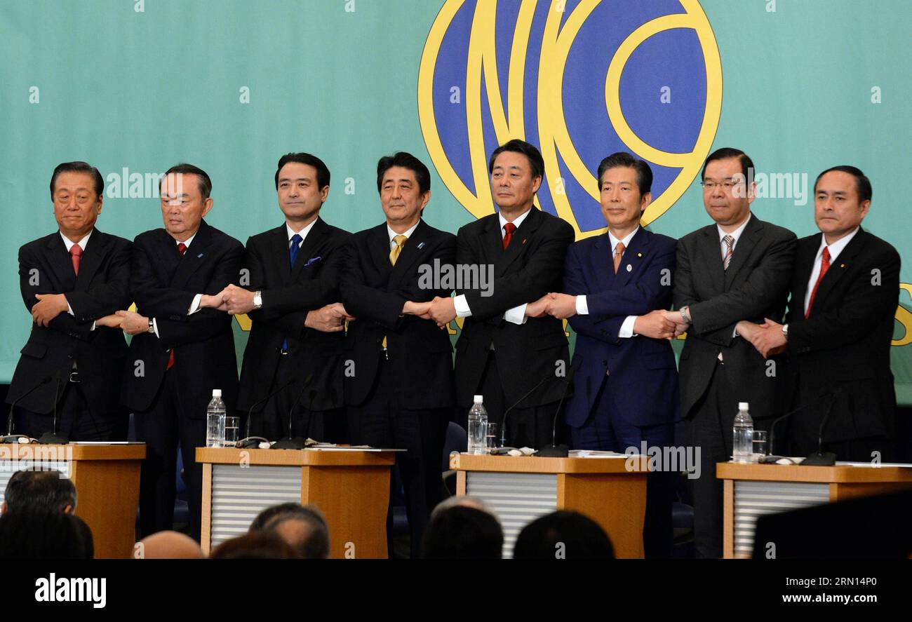 Japanese Prime Minister and President of the Liberal Democratic Party (LDP) Shinzo Abe (4th L) and presidents of opposition parties pose for a group photo during a debate held in the Japan National Press Club in Tokyo, Japan, on Dec. 1, 2014. Japanese opposition parties on Monday criticized Prime Minister Shinzo Abe s policies on economy and security in a debate held here ahead of the Dec. 14 general election. )(bxq) JAPAN-TOKYO-OPPOSITION PARTIES MaxPing PUBLICATIONxNOTxINxCHN   Japanese Prime Ministers and President of The Liberal Democratic Party LDP Shinzo ABE 4th l and Presidents of Oppos Stock Photo