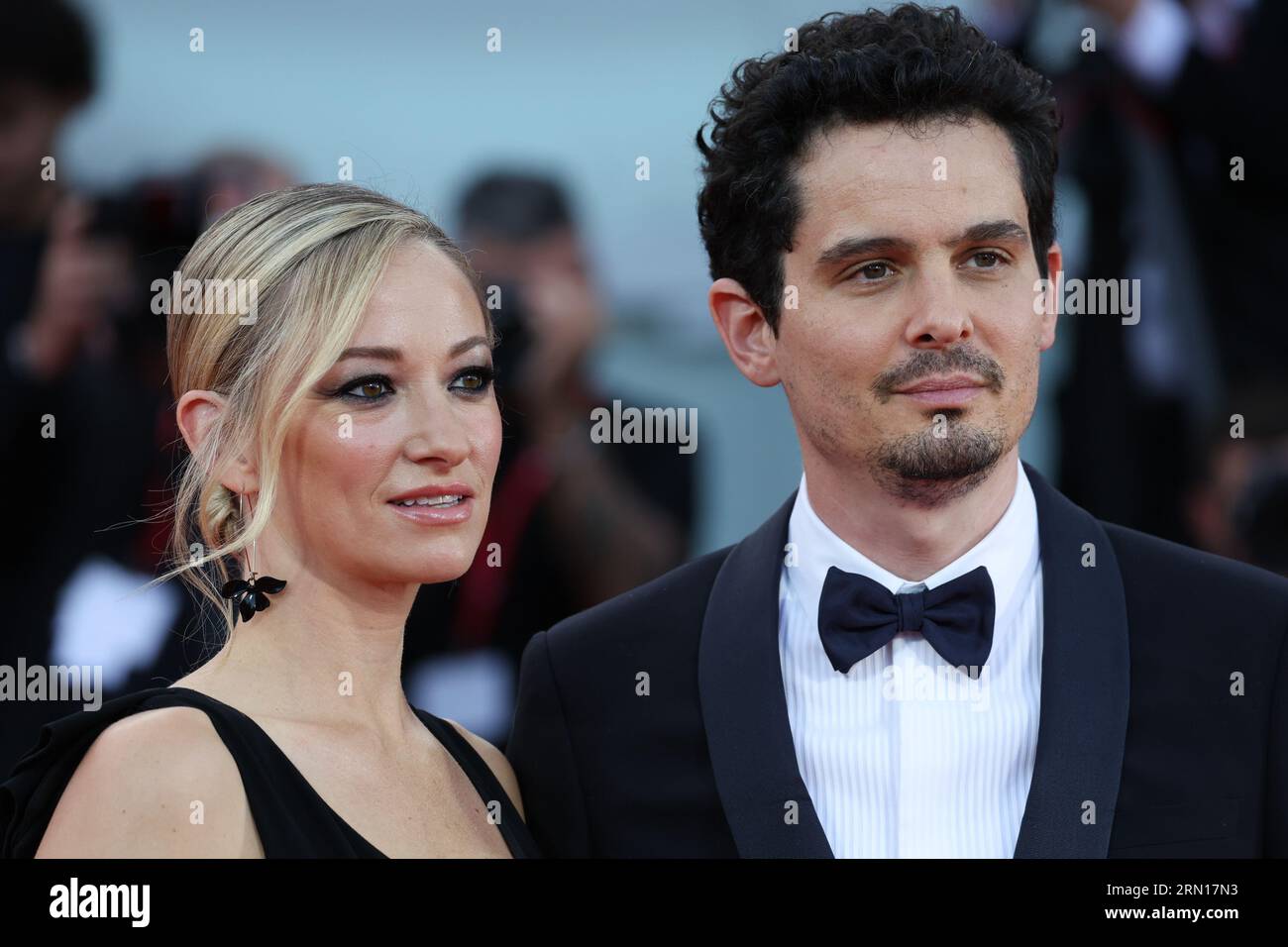 Olivia Hamilton and Damien Chazelle attend the opening red carpet at the 80th Venice International Film Festival on August 30, 2023 in Venice, Italy. Stock Photo