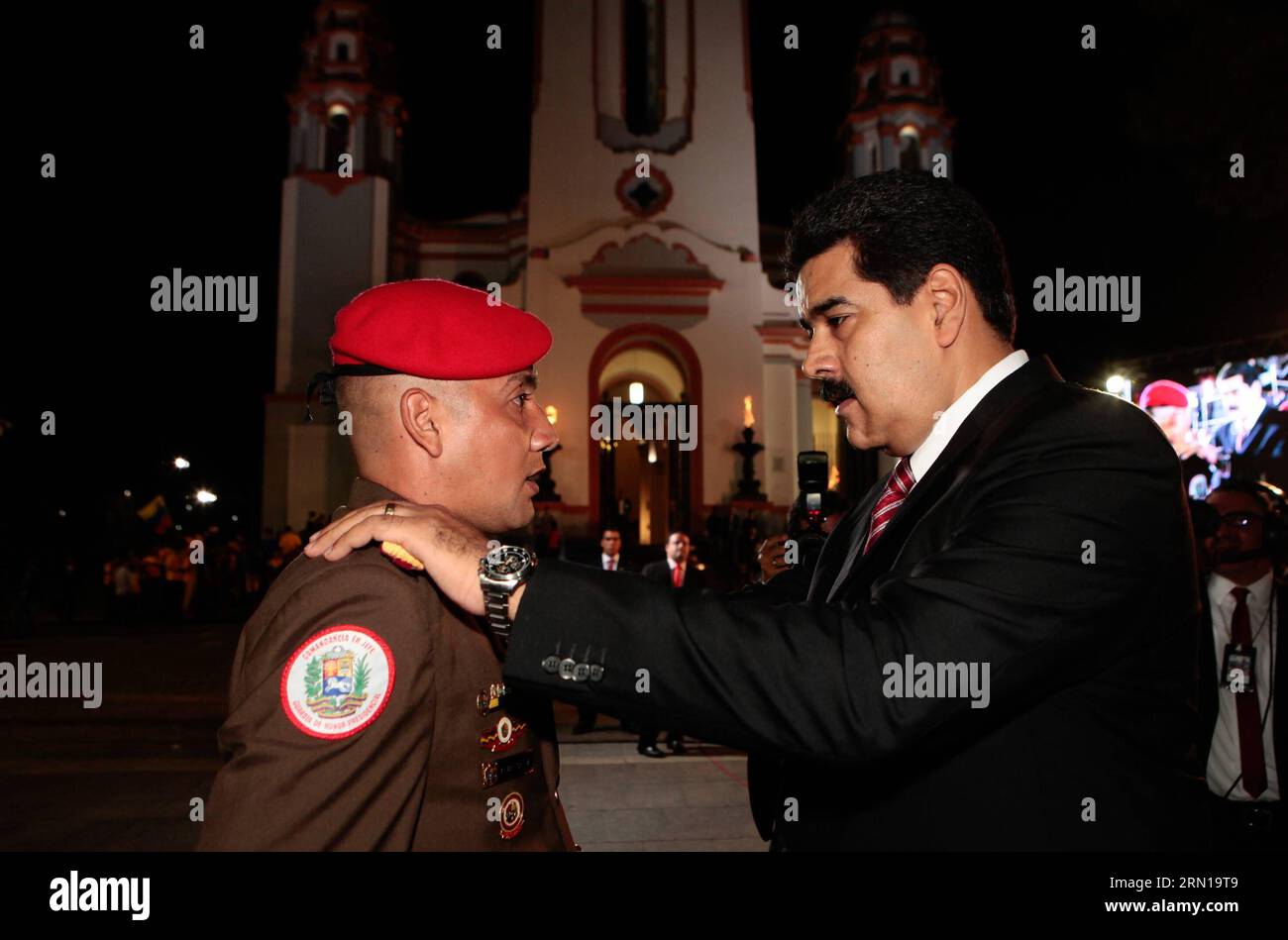 CARACAS, Dec. 9, 2014 -- Image provided by shows Venezuelan President Nicolas Maduro (R) talking with a soldier during a ceremony marking the 190th anniversary of the Battle of Ayacucho, at the National Pantheon in Caracas, Venezuela, on Dec. 9, 2014. ) VENEZUELA-CARACAS-POLITICS-MADURO VENEZUELA SxPRESIDENCY PUBLICATIONxNOTxINxCHN   Caracas DEC 9 2014 Image provided by Shows Venezuelan President Nicolas Maduro r Talking With a Soldier during a Ceremony marking The 190th Anniversary of The Battle of Ayacucho AT The National Pantheon in Caracas Venezuela ON DEC 9 2014 Venezuela Caracas POLITICS Stock Photo