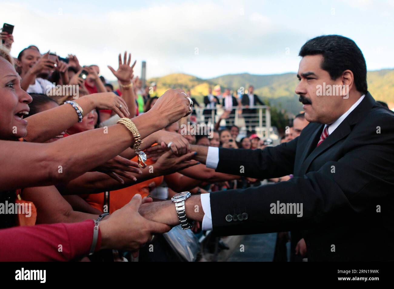 CARACAS, Dec. 9, 2014 -- Image provided by shows Venezuelan President Nicolas Maduro (R) meeting with people ahead of a ceremony marking the 190th anniversary of the Battle of Ayacucho, at the National Pantheon in Caracas, Venezuela, on Dec. 9, 2014. ) VENEZUELA-CARACAS-POLITICS-MADURO VENEZUELA SxPRESIDENCY PUBLICATIONxNOTxINxCHN   Caracas DEC 9 2014 Image provided by Shows Venezuelan President Nicolas Maduro r Meeting With Celebrities Ahead of a Ceremony marking The 190th Anniversary of The Battle of Ayacucho AT The National Pantheon in Caracas Venezuela ON DEC 9 2014 Venezuela Caracas POLIT Stock Photo