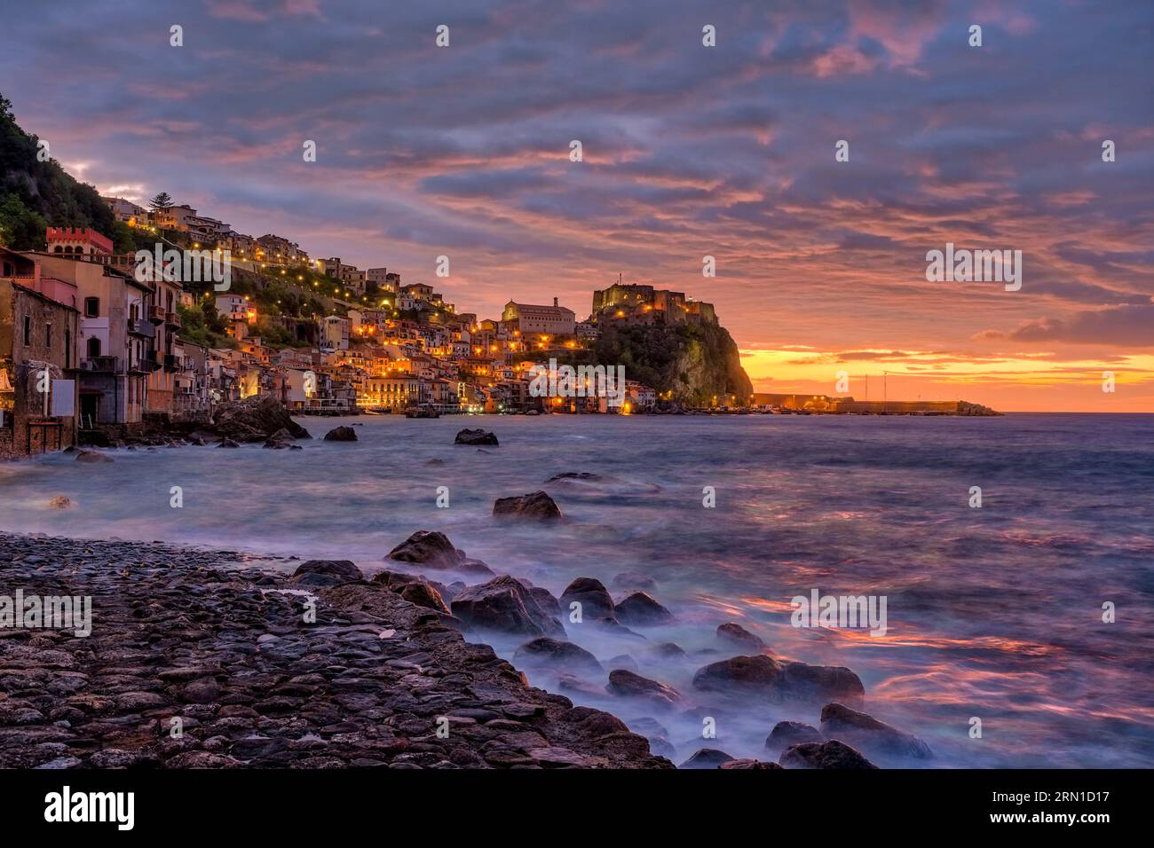 The Ruffo Castle and the houses of the small town, located on a rock ...