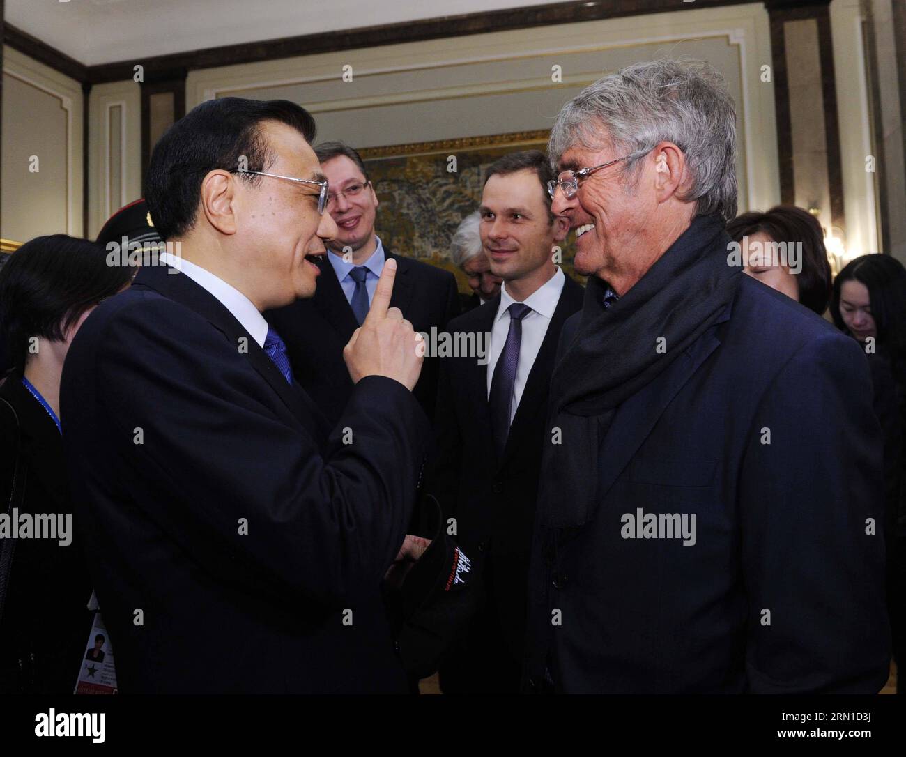 BELGRADE, Dec. 18, 2014 -- Chinese Premier Li Keqiang (L, front) talks with famous soccer coach Bora Milutinovic in Belgrade, Serbia, Dec. 18, 2014. Li was presented the charter of honorary citizen of Belgrade on Thursday afternoon and exchanged views with some distinguished Serbian personages on expanding bilateral cooperation in such areas as culture and sports. ) (lfj) SERBIA-BELGRADE-CHINA-LI KEQIANG-VISIT RaoxAimin PUBLICATIONxNOTxINxCHN   Belgrade DEC 18 2014 Chinese Premier left Keqiang l Front Talks With Famous Soccer Coach Bora Milutinovic in Belgrade Serbia DEC 18 2014 left what pres Stock Photo