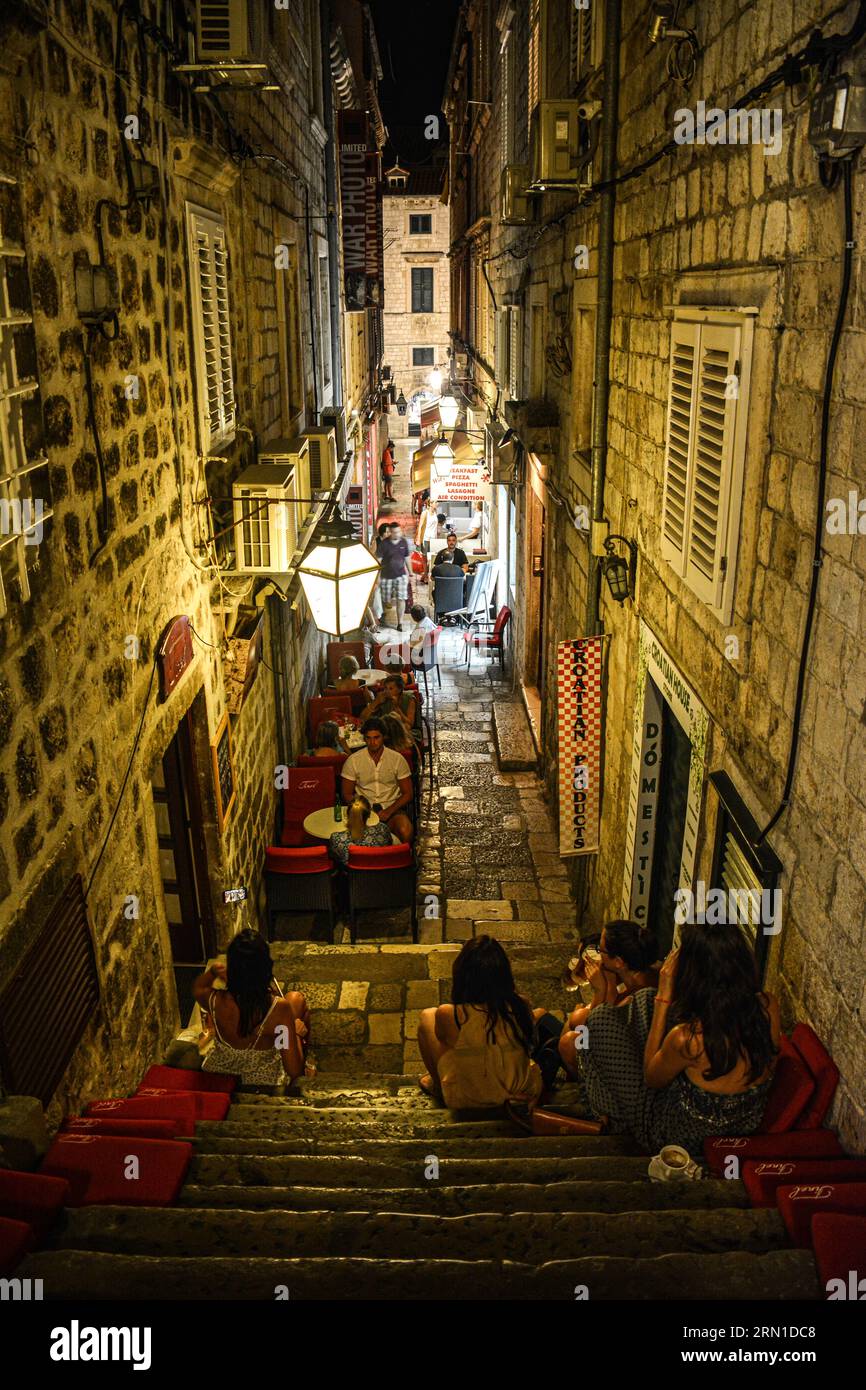 Nightlife in the Narrown Alleys of Dubrovnik Old Town - Croatia Stock Photo