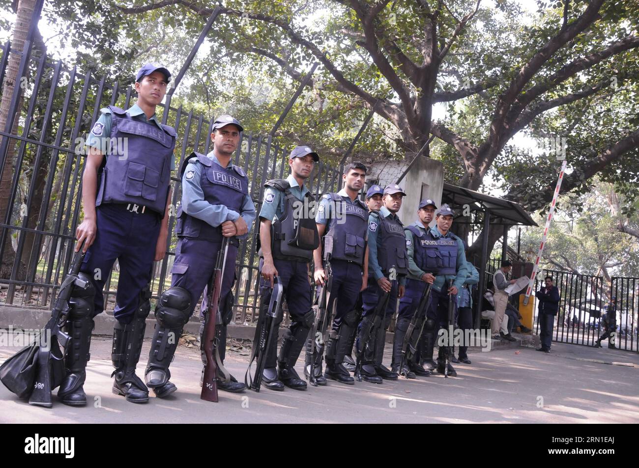 (141223) -- DHAKA, Dec. 23, 2014 -- Bangladeshi police stand guard in front of the Supreme Court during a verdict announcement in Dhaka, Bangladesh, Dec. 23, 2014. Bangladesh s International Crimes Tribunal (ICT)-1 found the former Minister Syed Mohammed Kaiser guilty of collaborating with Pakistani forces and committing war crimes including mass killings during the country s Liberation War in 1971, and has sentenced him to death. ) BANGLADESH-DHAKA-WAR CRIME-VERDICT SharifulxIslam PUBLICATIONxNOTxINxCHN   Dhaka DEC 23 2014 Bangladeshi Police stand Guard in Front of The Supreme Court during a Stock Photo