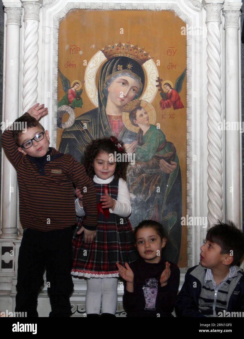 (141230) -- DAMASCUS, Dec. 30, 2014 -- Children attend the Christmas celebration at al-Zaitoun Cathedral in Damascus, capital of Syria, on Dec. 30, 2014. About 1,500 Syrian Christian kids and their parents gathered at al-Zaitoun Cathedral in Syria s capital Damascus to take part in a Christmas celebration. About 10 percent of population in Syria are Christian, who suffered persecution in some parts of the country by the hands of the extremist groups. )(zhf) SYRIA-DAMASCUS-CHRISTIAN-CHRISTMAS CELEBRATION bassemxtellawi PUBLICATIONxNOTxINxCHN   Damascus DEC 30 2014 Children attend The Christmas Stock Photo