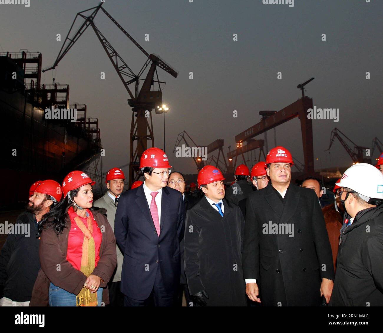 (150109) -- SHANGHAI, Jan. 9, 2015 -- Ecuadorian President Rafael Correa Delgado (2nd R) visits a dockyard at Changxing Island of Shanghai, east China, Jan. 9, 2015. ) (zkr) CHINA-SHANGHAI-ECUADORIAN PRESIDENT-VISIT(CN) RenxLong PUBLICATIONxNOTxINxCHN   Shanghai Jan 9 2015 Ecuadorian President Rafael Correa Delgado 2nd r visits a Dockyard AT Chang Xing Iceland of Shanghai East China Jan 9 2015 CCR China Shanghai Ecuadorian President Visit CN RenxLong PUBLICATIONxNOTxINxCHN Stock Photo
