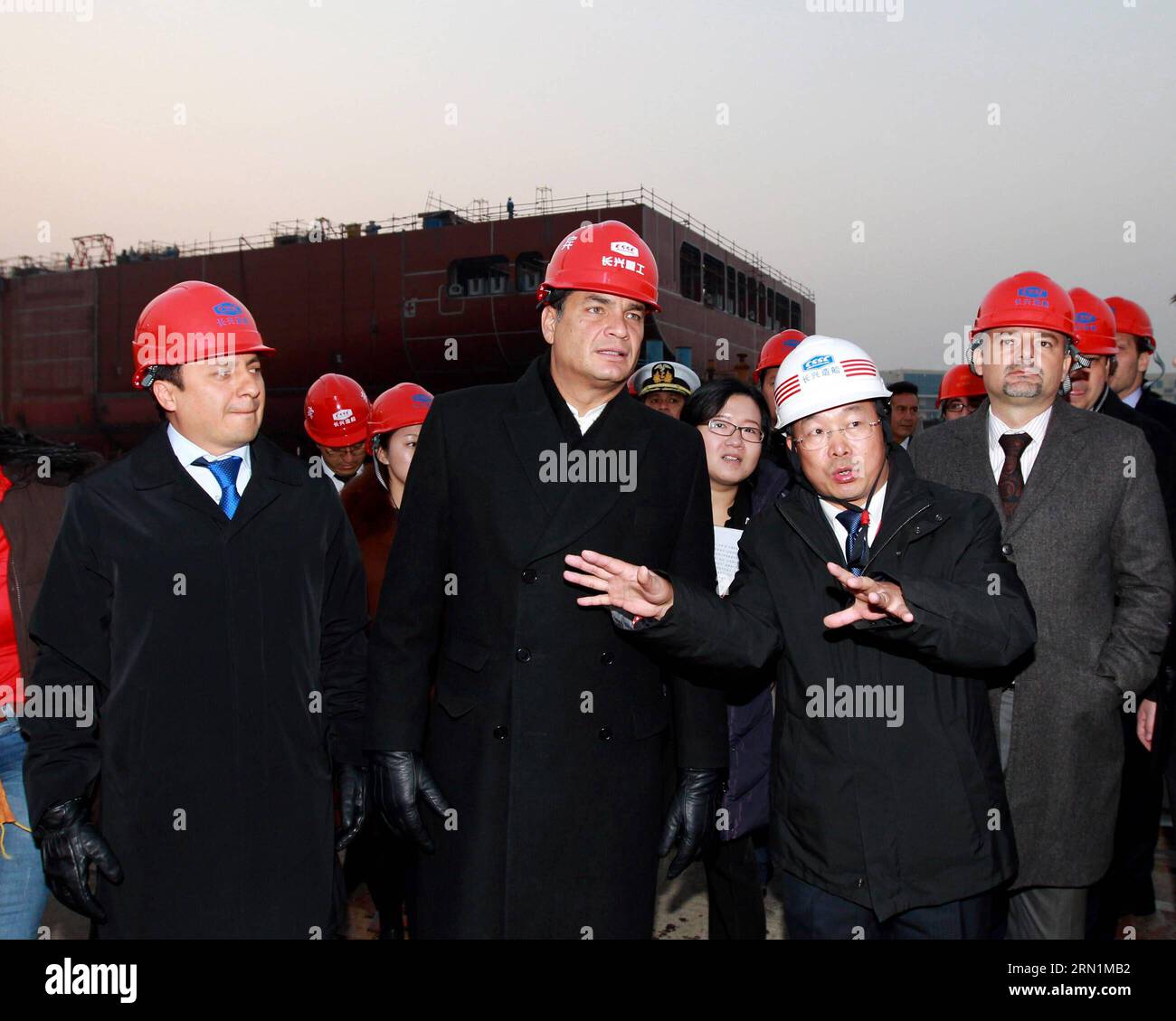 (150109) -- SHANGHAI, Jan. 9, 2015 -- Ecuadorian President Rafael Correa Delgado (C front) visits a dockyard at Changxing Island of Shanghai, east China, Jan. 9, 2015. ) (zkr) CHINA-SHANGHAI-ECUADORIAN PRESIDENT-VISIT(CN) RenxLong PUBLICATIONxNOTxINxCHN   Shanghai Jan 9 2015 Ecuadorian President Rafael Correa Delgado C Front visits a Dockyard AT Chang Xing Iceland of Shanghai East China Jan 9 2015 CCR China Shanghai Ecuadorian President Visit CN RenxLong PUBLICATIONxNOTxINxCHN Stock Photo