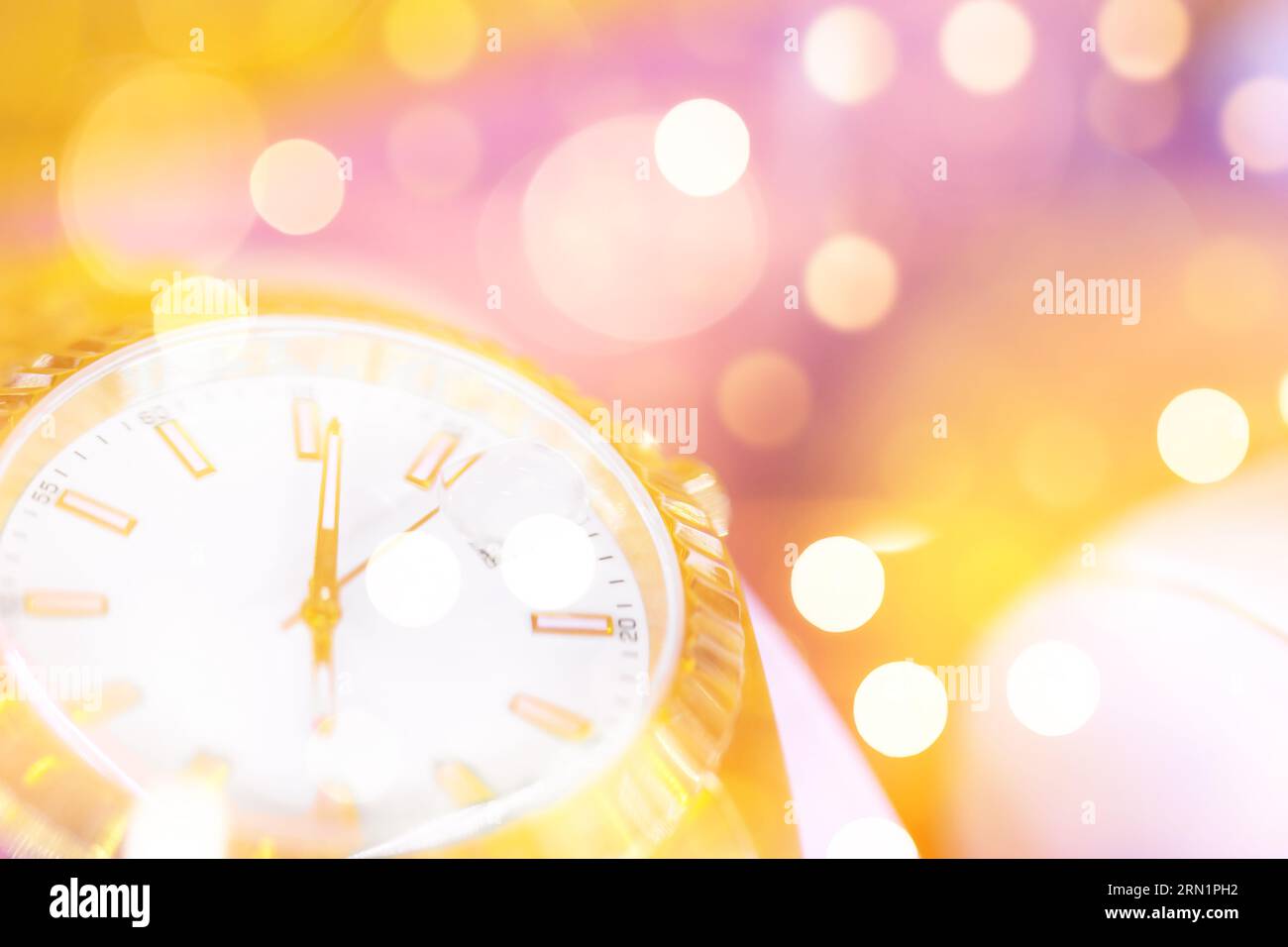 new-year-s-eve-holiday-party-gold-shining-pocket-watch-defocused