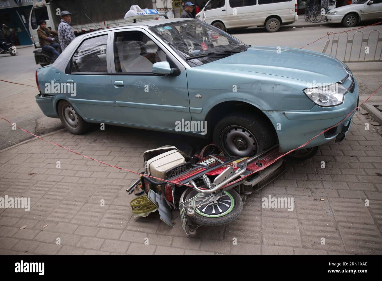 (150124) -- WUHAN, Jan. 24, 2015 -- Photo taken on Jan. 24, 2015 shows the incident site on a street in Jianghan district, Wuhan, capital of central China s Hubei Province. One people was killed and seven other injured in a knife attack in Wuhan on Saturday, local police said. Police detained a 38-year-old man and investigation into the attack is under way. (wyo) CHINA-WUHAN-INCIDENT-KNIFE ATTACK (CN) photomall PUBLICATIONxNOTxINxCHN   Wuhan Jan 24 2015 Photo Taken ON Jan 24 2015 Shows The INCIDENT Site ON a Street in Wuchang District Wuhan Capital of Central China S Hubei Province One Celebri Stock Photo