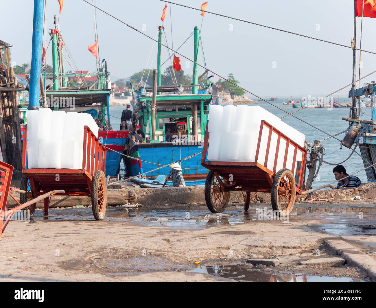 Ice blocks ready for delivery to fishing boats in Hai Thanh, a fishing village in the Thanh Hoa province of Vietnam. The Stock Photo