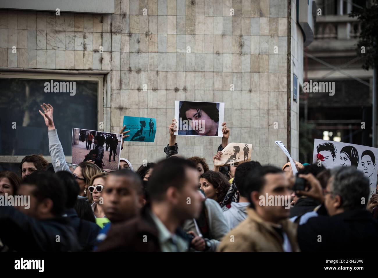 (150129) -- CAIRO, Jan. 29, 2015 -- Protester hold banners and photographs during a demonstration memorizing the female protester Shaimaa al-Sabbagh who was shot dead during a protest on the eve of the fourth anniversary of January 25 uprising, at Talaat Harb Square, the same place of her death, downtown Cairo, Egypt, on Jan. 29, 2015. ) (zjy) EGYPT-CAIRO-DEMONSTRATION PanxChaoyue PUBLICATIONxNOTxINxCHN   Cairo Jan 29 2015  Hold Banners and Photographs during a Demonstration memorizing The Female   Al  Who what Shot Dead during a Protest ON The Eve of The Fourth Anniversary of January 25 Upris Stock Photo