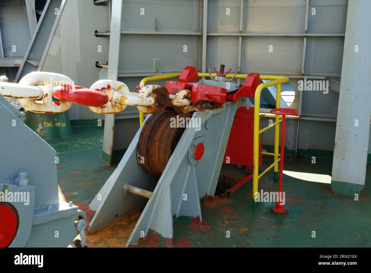 Close view on anchor roller chain stopper for hawse pipe on the forward