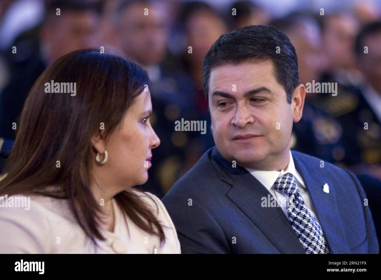 (150130) -- TEGUCIGALPA, Jan. 30, 2015 -- Honduras President Juan Orlando Hernandez (R) and his wife Ana Garcia de Hernandez (L) attend a religious service commemorating the 268th anniversary of the discovery of the Virgin of Suyapa, which is a six-centimeter tall 18th-century statue of the Virgin Mary, in the Suyapa Basilica, in Tegucigalpa, Honduras, on Jan. 30, 2015. Rafael Ochoa) (da) HONDURAS-TEGUCIGALPA-POLITICS-HERNANDEZ e RAFAELxOCHOA PUBLICATIONxNOTxINxCHN   Tegucigalpa Jan 30 2015 Honduras President Juan Orlando Hernandez r and His wife Ana Garcia de Hernandez l attend a Religious Se Stock Photo
