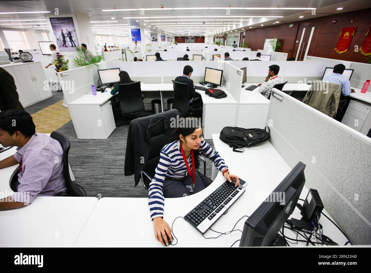 (150205) -- BENGALURU, Feb. 5, 2015 -- Employees work at Huawei s new research and development center in Bengaluru, India, Feb. 5, 2015. Chinese multinational networking and telecommunications equipment and services company Huawei on Thursday launched its new research and development center in Bengaluru. With an investment of 170 million U.S. dollars and an area of 20 acres, it is the largest research and development center of Huawei outside of China. The new center is also an exhibit of cooperation between China and India in the field of information and communications technology (ICT). )(azp) Stock Photo