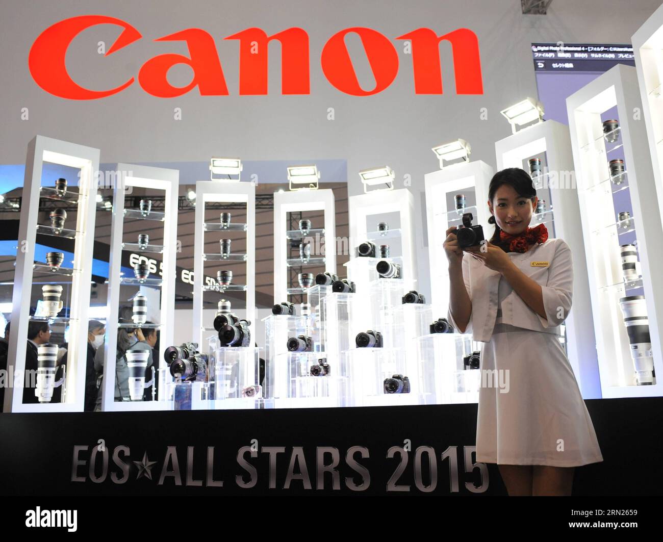 (150212) -- TOKYO, Feb. 12, 2014 -- A model poses for photos with a Canon product at the CP+ Camera and Photo Imaging Show in Yokohama, Japan, Feb. 12, 2015. The four-day exhibition was opened on Feb. 12. ) JAPAN-YOKOHAMA-TECHNOLOGY-SHOW Stringer PUBLICATIONxNOTxINxCHN   Tokyo Feb 12 2014 a Model Poses for Photos With a Canon Product AT The  Camera and Photo Imaging Show in Yokohama Japan Feb 12 2015 The Four Day Exhibition what opened ON Feb 12 Japan Yokohama Technology Show Stringer PUBLICATIONxNOTxINxCHN Stock Photo