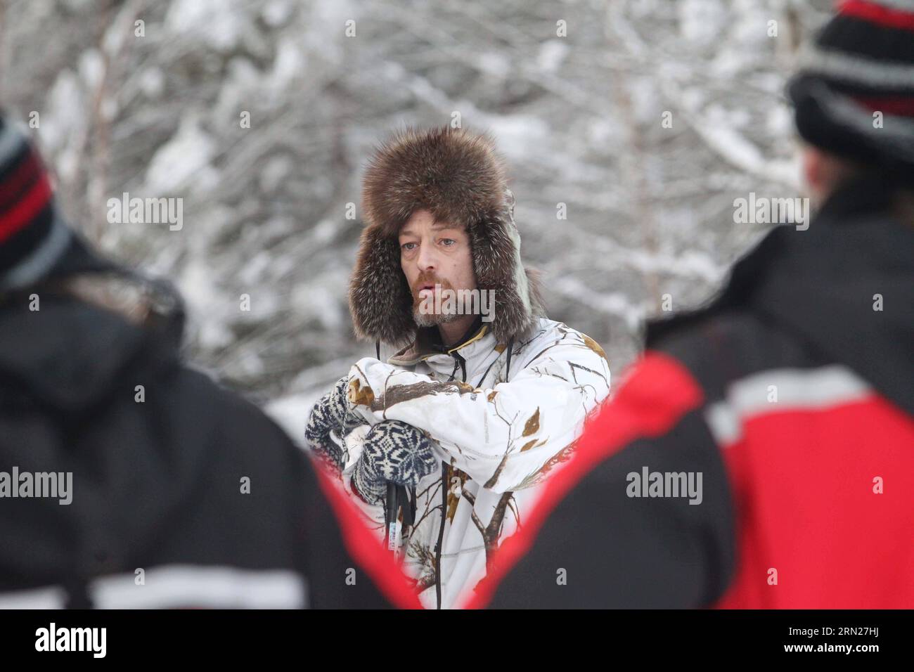 (150215) -- HELSINKI, Feb. 12, 2015 -- A Finnish coach teaches tourists how to walk on snow shoes in Savukoski, northern Finland, on Feb. 12, 2015. As being trained to live in Arctic wilderness is becoming a popular recreation, many European choose to travel to Finnish Lapland to spend their winter vacations. ) FINLAND-SAVUKOSKI-ARCTIC WILDERNESS-VACATION LixJizhi PUBLICATIONxNOTxINxCHN   Helsinki Feb 12 2015 a Finnish Coach teaches tourists How to Walk ON Snow Shoes in  Northern Finland ON Feb 12 2015 As Being trained to Live in Arctic Wilderness IS Becoming a Popular Recreation MANY European Stock Photo