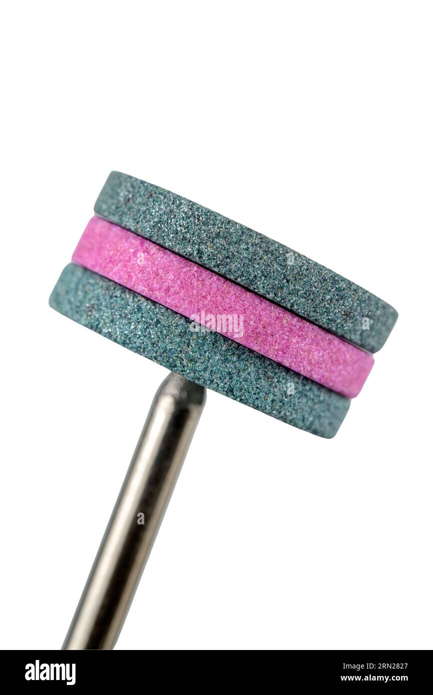 Three discs of abrasive stone tool isolated in white background Stock