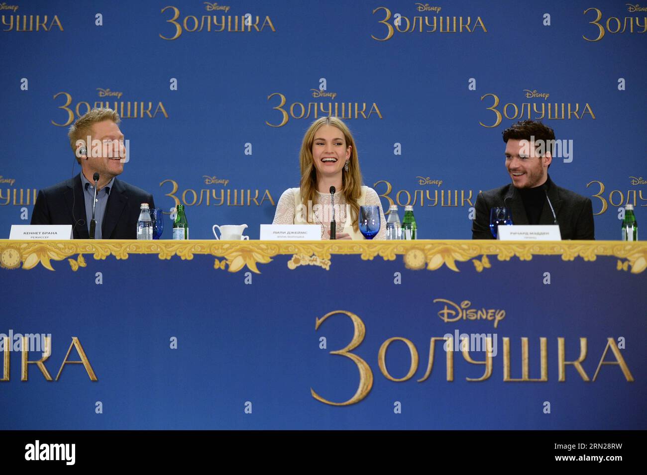 (150217) -- MOSCOW, Feb. 17, 2015 -- Director Kenneth Branagh, actress Lily James and actor Richard Madden (from L to R) attend a press conference during the premiere of Disney s new movie Cinderella in Moscow, Russia, on Feb. 17, 2015. ) RUSSIA-MOSCOW-MOVIE-CINDERELLA-PREMIERE PavelxBednyakov PUBLICATIONxNOTxINxCHN   Moscow Feb 17 2015 Director Kenneth Branagh actress Lily James and Actor Richard Madden from l to r attend a Press Conference during The Premiere of Disney S New Movie Cinderella in Moscow Russia ON Feb 17 2015 Russia Moscow Movie Cinderella Premiere  PUBLICATIONxNOTxINxCHN Stock Photo