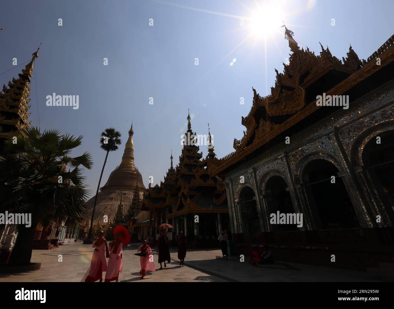 YANGON, Feb. 17, 2015 -- Buddhist monks and nuns visit the Shwedagon pagoda in Yangon, Myanmar, Feb. 17, 2015. Shwedagon Pagoda is a repository of the best of Myanmar s heritages -- architecture, sculpture and arts. It consists of hundreds of colorful temples, stupas and statues that reflect architectural styles spanning almost 2,500 years. ) MYANMAR-YANGON-SHWEDAGON PAGODA UxAung PUBLICATIONxNOTxINxCHN   Yangon Feb 17 2015 Buddhist Monks and Nuns Visit The Shwedagon Pagoda in Yangon Myanmar Feb 17 2015 Shwedagon Pagoda IS a repository of The Best of Myanmar S heritage Architecture Sculpture a Stock Photo